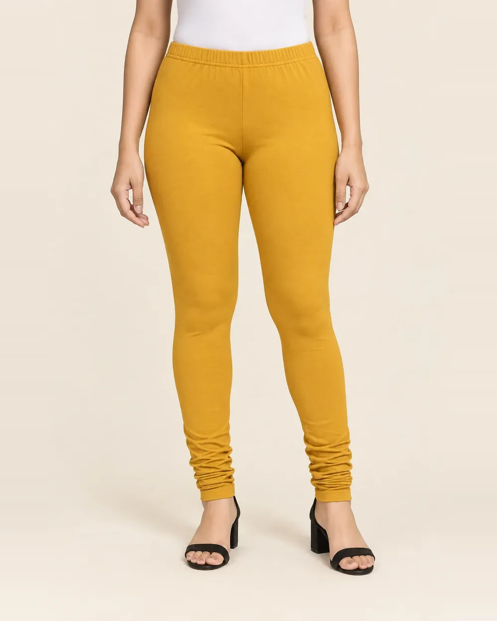 Sreeva mustard yellow full length cotton leggings with churidar gathers, deep golden yellow, front view